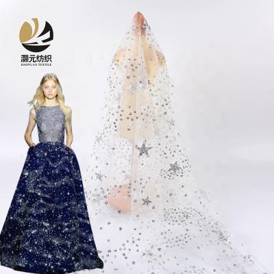 China Other Ready Goods Wholesale Fancy Printing 100% Polyester Galaxy Printed White Crystal Tulle Fabric for sale