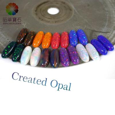 China Star Created Oval Opal Rich Color Cabochon Lavatory Gemstone for sale