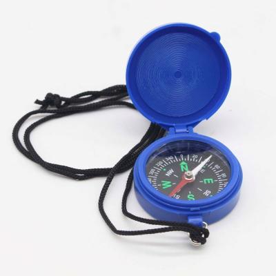 China Pointing Guide Emergency Raising Multifunctional Safety Whistle Compass Rescue Whistle Collar Pendant for sale