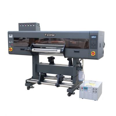 China Garment shops 2023 Yinstar 60cm popular new design digital inkjet UV dtf machine for logo and character of various products in all materials for sale