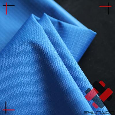 China Milky Coated Windproof Waterproof Ripstop 420D PU Nylon Fabric for sale