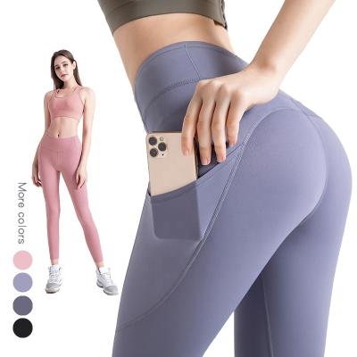 China 2021 New High-waisted Breathable Yoga Pants Women, Skinny Pants Hip-Rise Side Pocket Spandex Pants for sale