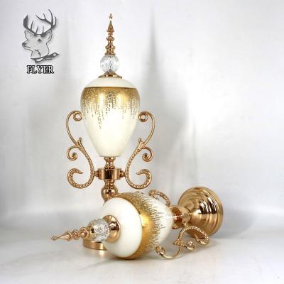 China Home Decoration Modern Gold Color Frosted Glass Candle Holder With Metal Base for sale