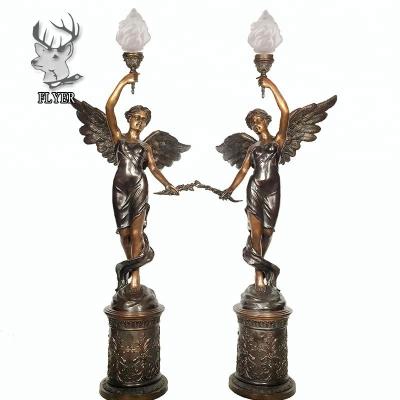 China Europe Home Decoration Life Size Bronze Angel Statue Holding Lamps Sculpture for sale