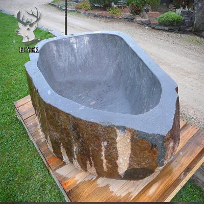 China high quality exterior freestanding natural stone bathtub on the double skirted side (left skirt) for sale