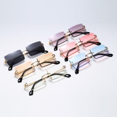 China 2021 Fashionable Rimless Metal Rimless Sunglasses High Quality Square Women Sun Glasses for sale