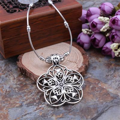 China Retro Jewelry Silver Alloy Cavity Nice Flower TRENDY Tibetan Chain Necklace Pendant Necklace For Lady Woman for sale