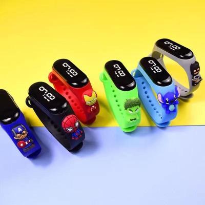 China Hot Alarm Superhero Cartoon Wristband Figures Digital Touch Watch Students LED Silicone Cartoon Watch For Kids Boys for sale