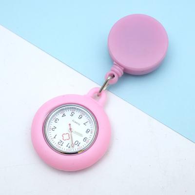 China Free Customized Nurse Pocket Silicone Watch Cartoon Logo Waterproof Breast Brooch Watch Water Resistant for sale