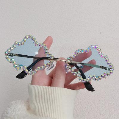 China High Quality Luxury Rhinestone Cloud Shape Rimless Sun Glass Bling Diamond Sunglasses Shades For Women for sale