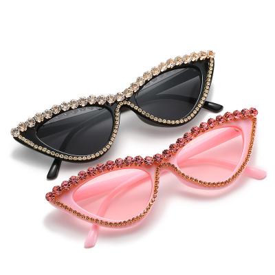 China 2022 new arrival high quality cat 3 fashionable sunglasses uv400 luxury rimless bling diamond cat eye sunglasses for women for sale