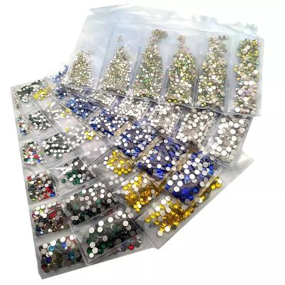 China 3d nail art DIY decoration Multi-size glass nail rhinestones for nail art decorations crystals rhinestones charms split mixed size rhinestone set for sale