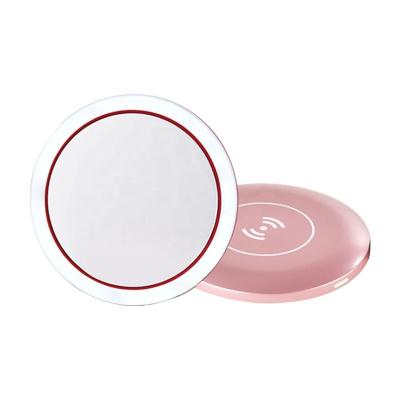 China Portable LED Lighted Lighted Mini Circular Compact Travel Sensing Lighting Cosmetic Mirror USB Wireless Makeup Mirror Filling Mirror for sale