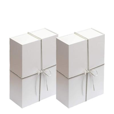 China Folding Recyclable Luxury Cardboard Flat Pack Box Pink Ribbon Paper Closures Book Shaped Foldable Packaging Gift Boxes With Magnetic Lid for sale