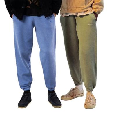 China Anti-Wrinkle Mens Joggers Pants Zipper Pockets Luxury Casual Mens Trousers Cotton Jogger Pants for sale