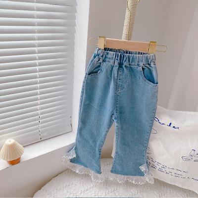 China Anti-wrinkle spring 2022 new girls' jeans baby girls' lace flared trousers children's trousers for sale