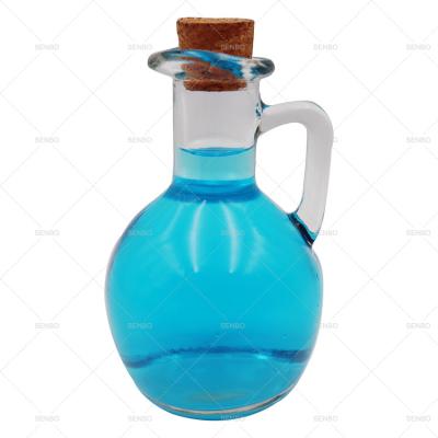 China Cork Lid With Handle Cheap Cooking Olive Oil Jar Pot Glass Bottle With Handle And Cork Stoppers for sale