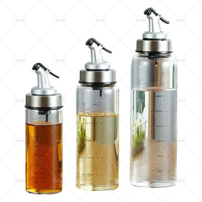 China Sustainable Sauce Cooking Kitchen Condiment Set Olive Oil And Vinegar Dispenser And Glass Measuring Bottle 300ml Free Drip for sale