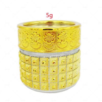 China Luxury Glass Personal Care Saffron 5g10g Package Bottle Container With Gold Lid Wholesale for sale