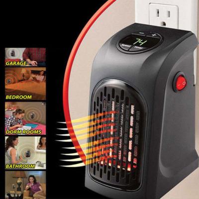 China Hotel Mini Handy Electric Heater Portable Home Heating Fan Air Heater Handy Warmer for sale