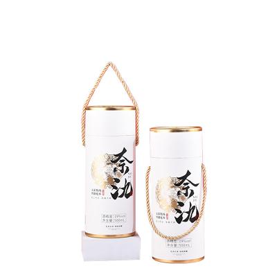 China Customized Biodegradable White Paper Cardboard Packaging Tube Wine Bottle Cylinder Portable Box Food Grade Kraft Paper With Rope Handle for sale