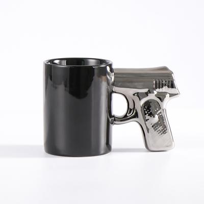 China Viable Mug Ceramic Coffee Mugs Gun Attack Gun Mug For Amazing Gift for sale