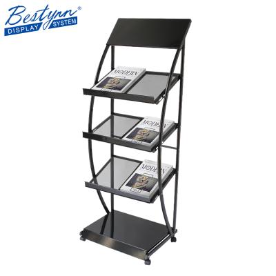 China Magazine Brochure Rolling Rack Shelf Newspaper Rack Rolls Block Rolling Display Stand for sale