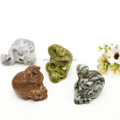 China Dong Hai for the sample! Reiki jade topaz carved skulls with snake 2021 high quality natural healing crystal quartz carving craft for sale