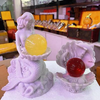 China China Resin Crystal Ball Holder Mermaid Shape Sphere Position Shell Dolphin Shape Crafts for sale