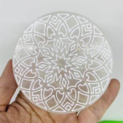 China Dong Hai Wholesale Natural Pattern Selenite Coaster Carved Printing Slices Than Slab Crystal Energy Disc Protection for sale