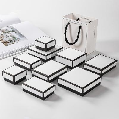 China Fashionable and Simple Custom Small Square Lid and Base White Cardboard Paper Jewelry Necklace Gift Box Packaging for sale