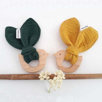 China Soft Organic Rabbit Ears Wooden Muslin Teether Baby Bird Toy Rattle Teething Toy for sale