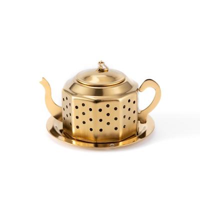 China Desktop Shell Shape Flower Teapot Loose Leaf Tea Infuser Tea Stocked Golden Strainer for sale