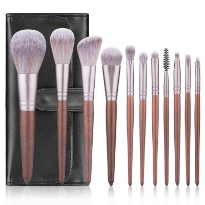 China Angular Blush Makeup Cosmetic Tools Face Wood Handle 11 Pieces Makeup Brush Set With Private Label for sale