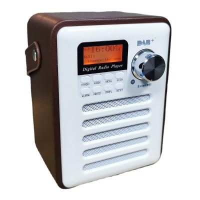 China Retro DAB/FM BT/TF card/U-disk MP3 radio wooden speaker with handle, (BT) U-disk/SD card wireless play, rechargeable battery, good sound quality for sale