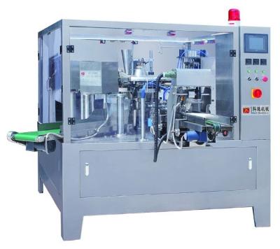 China Automatic Rotary Food Packing Machine For Fresh Tea Milk Sachet Packaging Machine for sale