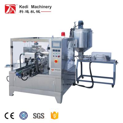 China Food Premade Bag Filling Machines Ketchup Pouch Fill Seal Rotary Packing Device Wooden Packaging 30-60bags/min 1700KG+-1% for sale