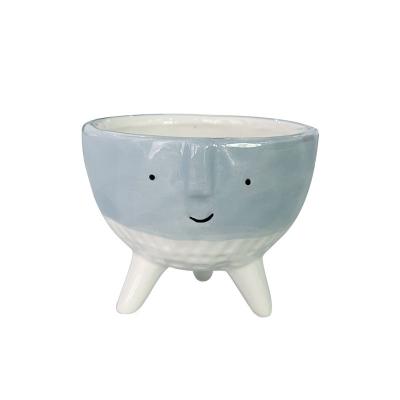 China Minimalist International Market Price Smile Expression Design Ceramic Succulent Plants Flower Pots For Decorative for sale