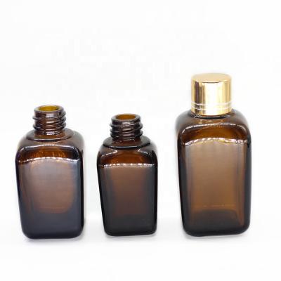 China Pharmaceutical Essential Oil Glass Bottle 30ml 50ml Amber Square Bottles for sale