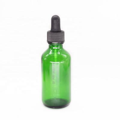 China Recycable Boston Round Glass Bottles 60ml Green Glass Bottles For Essential Oil for sale