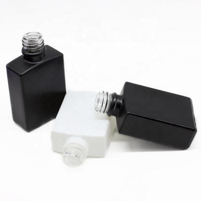 China Personal Care Matte Black White Rectangle Glass Flat Square Bottle With Glass Dropper For Perfume for sale