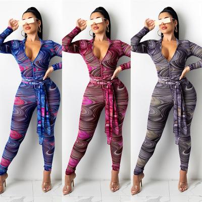 China Autumn QUICK DRY V-Neck Long Sleeve Print Rompers Fall Sexy Women Clothing One-Piece Overalls With Belt for sale