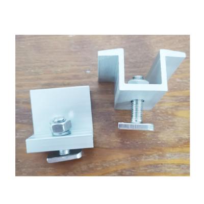 China Solar PV Solar Panel Installation Base Aluminum Rail Clamps Unistrute Solar Clamps Adjustable Solar End Clamp for sale