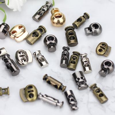 China Newest Shape Elastic Metal Spring Rope Lock Stopper Adjustable Buckle Custom Wholesale Nickel Free Drawstring Toggle for hoodies spo for sale