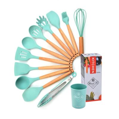 China Viable wholesale porcelain Yangjiang kitchenware eco-friendly cookware sets utensils product silicone wooden handle for sale