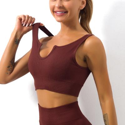 China Breathable Ribbed Seamless 2 Piece Logo Women Gym Active Fitness Custom Short Bra Wear Yoga Set for sale