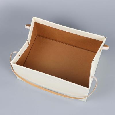 China Recycled Materials Customized kraft paper foldable portable shoe packing flower bag bouquet packaging bag rose boxes flower packaging for sale