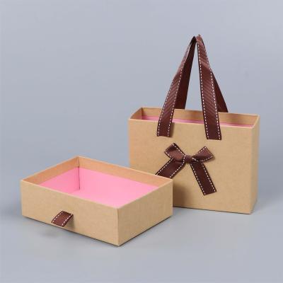 China Recycled Materials Christmas Packaging Gift Box Custom Logo Cardboard Jewelry Gift Bag Necklace Drawing Paper Packaging Gift Box Paper Boxes for sale