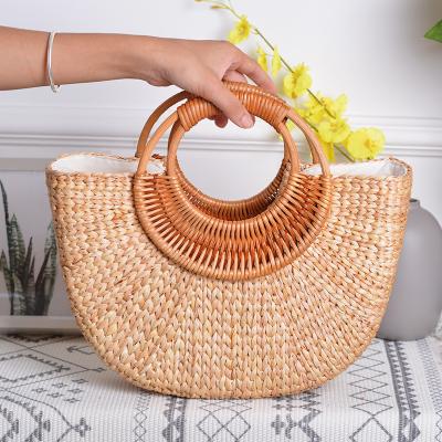 China 2019 Handmade Natural Wooden Straw Bag Women's Autumn Winter Handbag Handle Wooden Bag for sale