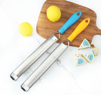 China Premium Sharp Parmesan Cheese Ginger Garlic Lemon Zester Citrus Stainless Steel Kitchen Tool Cheese Grater for sale